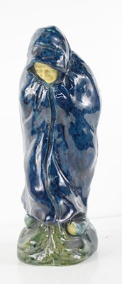 Lot 172 - A 19th century majolica blue glaze figure of a...
