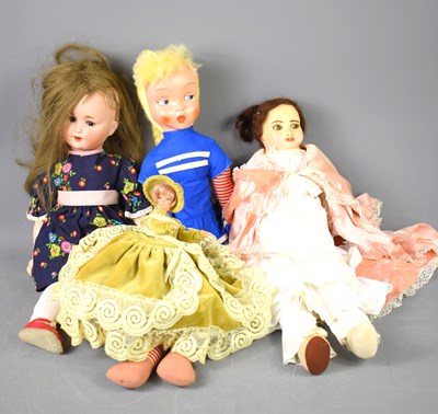 Lot 569 - A group of vintage dolls to inlcude a German...