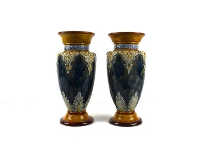 Lot 33 - A pair of Doulton Lambeth vases, with mottled...