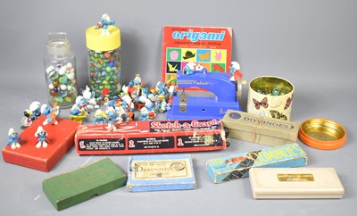 Lot 570 - A group of vintage games, marbles and toys to...