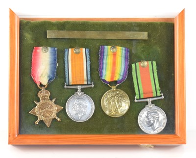 Lot 348 - A WWI medal group awarded to Pte J.T Bond,...